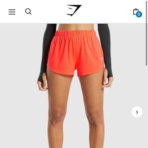 Gymshark - training mesh shorts - coral - L
